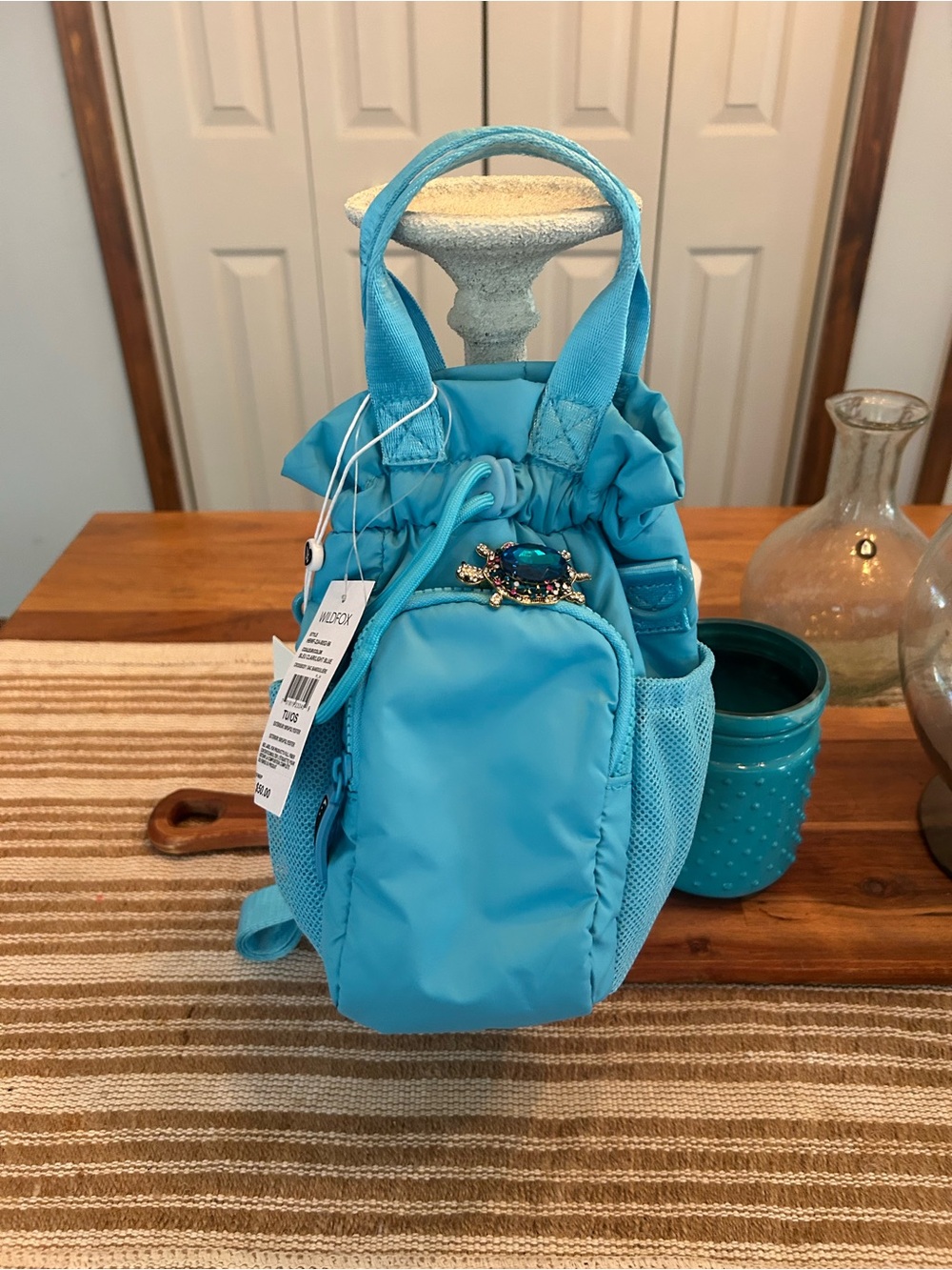 Turquoise Blue Women's Drawstring Mini Backpack - Picture 2 of 7